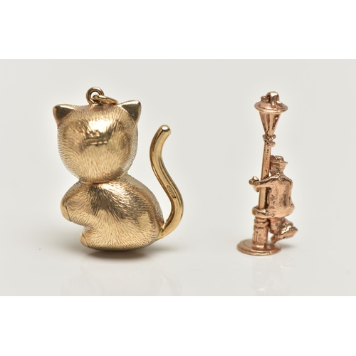 22 - TWO 9CT GOLD CHARMS, the first a yellow gold cat charm, hallmarked 9ct Birmingham import, approximat... 