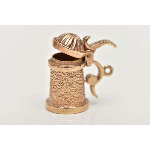 23 - A 9CT GOLD CHARM, yellow gold charm of a tankard with an opening lid, hallmarked 9ct London, approxi... 