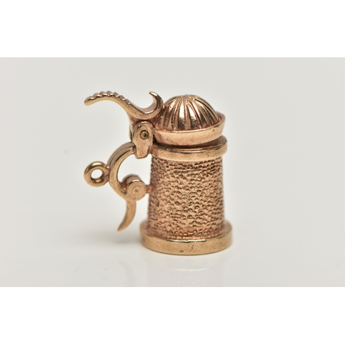 23 - A 9CT GOLD CHARM, yellow gold charm of a tankard with an opening lid, hallmarked 9ct London, approxi... 