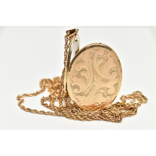 30 - A 9CT GOLD LOCKET PENDANT, yellow gold oval locket embossed with a foliage pattern, approximate leng... 