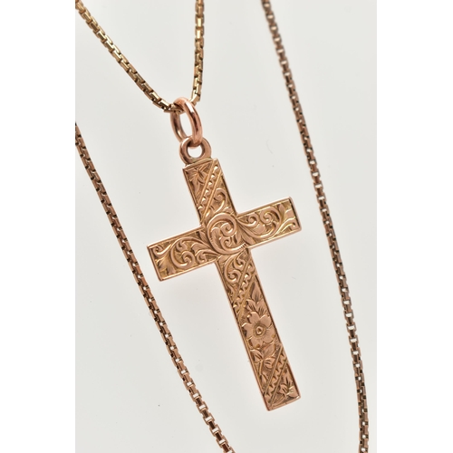 34 - A 9CT GOLD PENDANT AND CHAIN, a rose gold cross pendant with floral and foliage engraved detail, hal... 