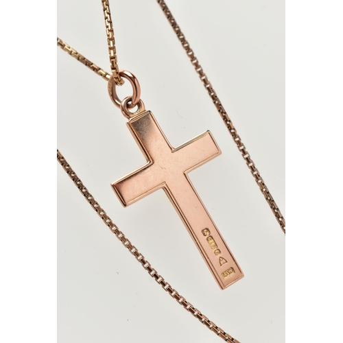 34 - A 9CT GOLD PENDANT AND CHAIN, a rose gold cross pendant with floral and foliage engraved detail, hal... 