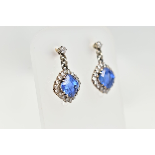 5 - A PAIR OF EARLY 20TH CENTURY SAPPHIRE AND DIAMOND EARRINGS, each earring set with a cushion cut sapp... 