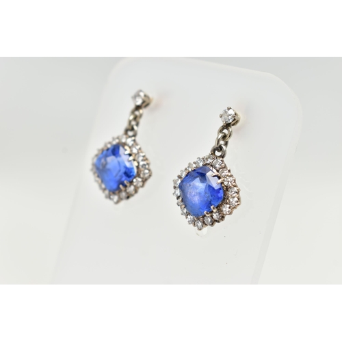 5 - A PAIR OF EARLY 20TH CENTURY SAPPHIRE AND DIAMOND EARRINGS, each earring set with a cushion cut sapp... 