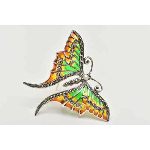 54 - A WHITE METAL PLIQUE A JOUR BROOCH, in the form of butterfly with red, green and yellow enamel wings... 