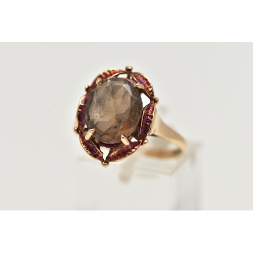 57 - A 9CT GOLD SMOKY QUARTZ RING, designed with a claw set, oval cut smoky quartz, within an openwork su... 