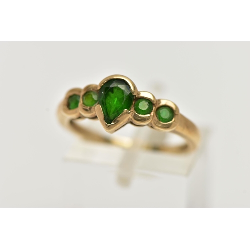 58 - A 9CT GOLD CHROME DIOPSIDE RING, designed with a central pear cut stone flanked with four smaller ci... 