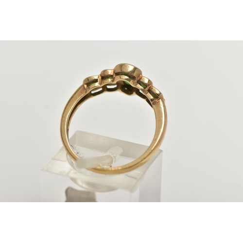 58 - A 9CT GOLD CHROME DIOPSIDE RING, designed with a central pear cut stone flanked with four smaller ci... 