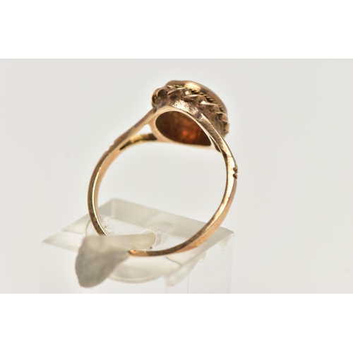 60 - A 9CT GOLD OPAL RING, designed with an opal cabochon, in a milgrain collet setting, to a rope twist ... 