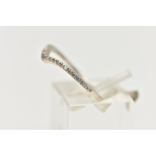 61 - A WHITE  METAL WISHBONE RING, set with small colourless cubic zirconia (two stones are missing), sta... 