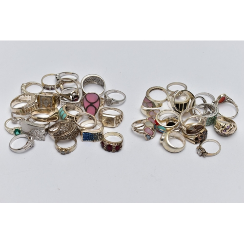 82 - AN ASSORTMENT OF WHITE METAL RINGS, forty-three rings in total, of various designs, some with marks ... 