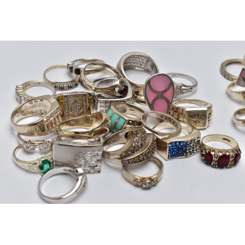 82 - AN ASSORTMENT OF WHITE METAL RINGS, forty-three rings in total, of various designs, some with marks ... 