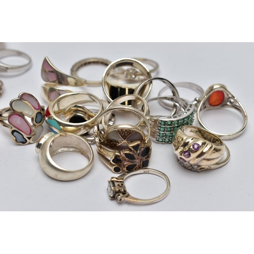 82 - AN ASSORTMENT OF WHITE METAL RINGS, forty-three rings in total, of various designs, some with marks ... 