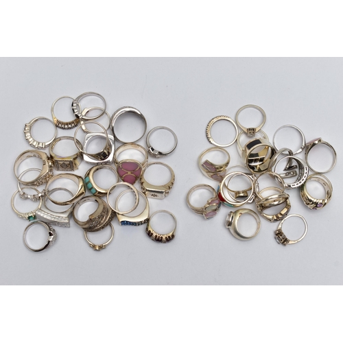 82 - AN ASSORTMENT OF WHITE METAL RINGS, forty-three rings in total, of various designs, some with marks ... 