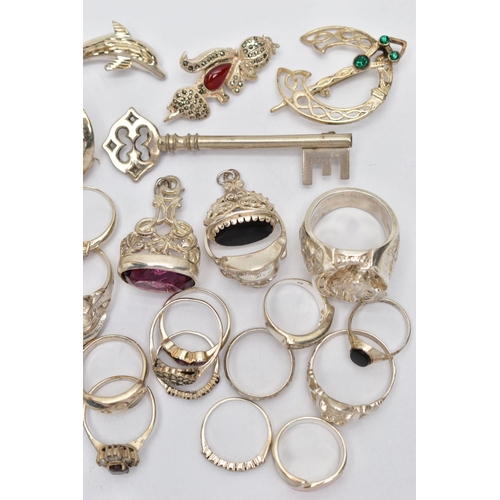 87 - AN ASSORTMENT OF WHITE METAL JEWELLERY, to include three white metal fobs, an assortment of rings, b... 