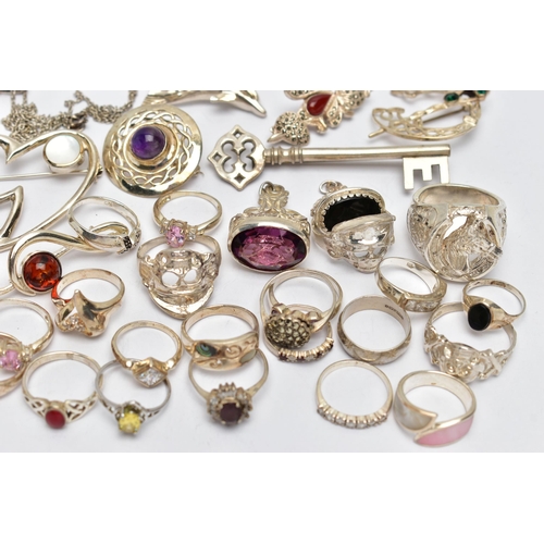 87 - AN ASSORTMENT OF WHITE METAL JEWELLERY, to include three white metal fobs, an assortment of rings, b... 