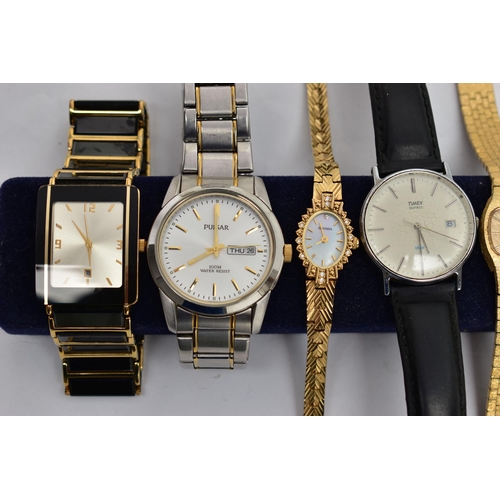 98 - A SMALL BOX OF WATCHES, to include a yellow metal 'Rotary' ladys cocktail watch, two ladys 'Sekonda'... 