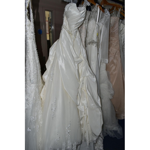 291 - A GROUP  OF ELEVEN WEDDING DRESSES, end of season clearance, some dresses may have marks or minor da... 