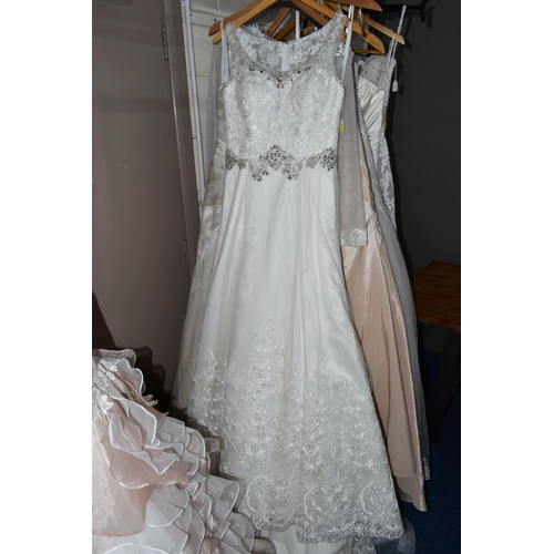 291 - A GROUP  OF ELEVEN WEDDING DRESSES, end of season clearance, some dresses may have marks or minor da... 