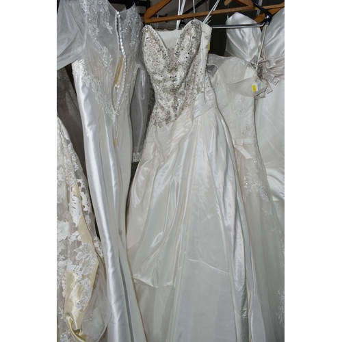 292 - A GROUP OF TEN WEDDING DRESSES, end of season stock clearance, some dresses may have marks or minor ... 