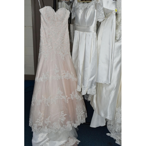 292 - A GROUP OF TEN WEDDING DRESSES, end of season stock clearance, some dresses may have marks or minor ... 