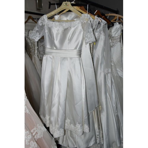 292 - A GROUP OF TEN WEDDING DRESSES, end of season stock clearance, some dresses may have marks or minor ... 