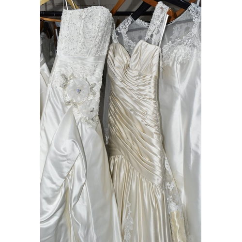 292 - A GROUP OF TEN WEDDING DRESSES, end of season stock clearance, some dresses may have marks or minor ... 