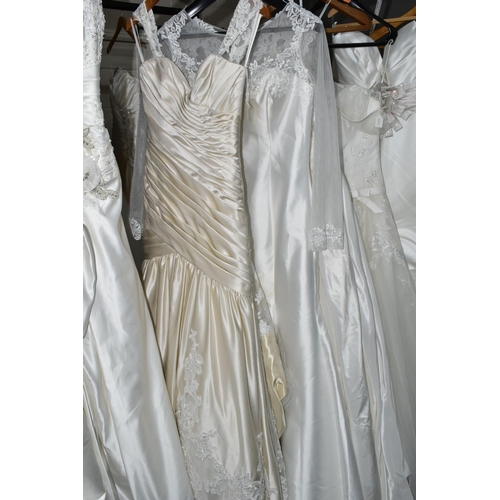 292 - A GROUP OF TEN WEDDING DRESSES, end of season stock clearance, some dresses may have marks or minor ... 