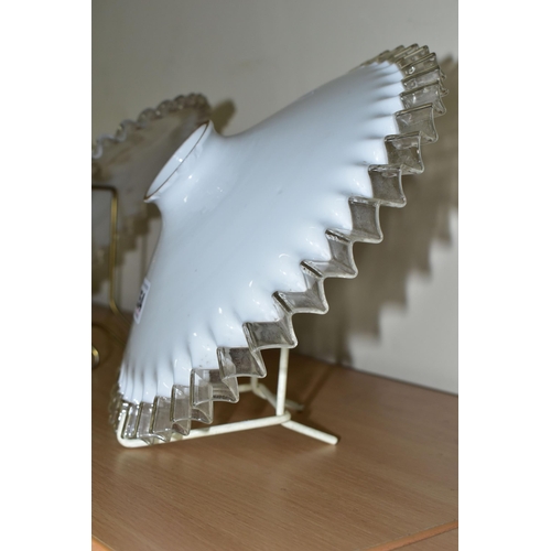 354 - FOUR GLASS LAMPSHADES, each in white opaque glass with a clear wavy edge, slight variations in size ... 