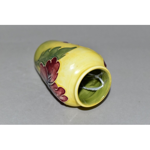 356 - A SMALL MOORCROFT POTTERY HIBISCUS VASE, tube lined with red/purple hibiscus on a graduated yellow a... 