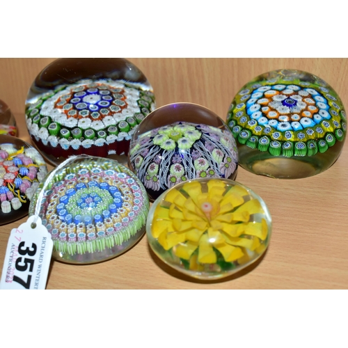 357 - SEVEN GLASS PAPERWEIGHTS, mainly millefiori types, to include one Perthshire paperweight with pastel... 