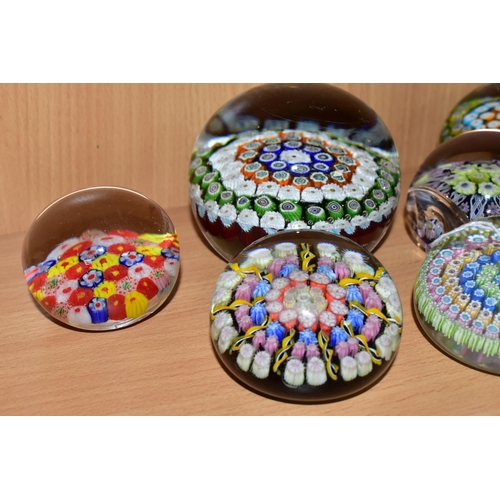 357 - SEVEN GLASS PAPERWEIGHTS, mainly millefiori types, to include one Perthshire paperweight with pastel... 