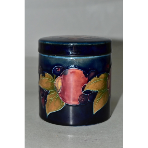 358 - A MOORCROFT POTTERY POMEGRANATE COVERED JAR, of cylindrical form, tube lined with pomegranates and b... 