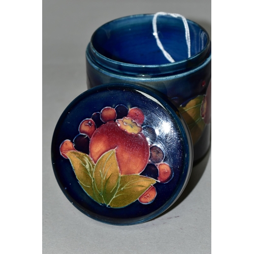 358 - A MOORCROFT POTTERY POMEGRANATE COVERED JAR, of cylindrical form, tube lined with pomegranates and b... 