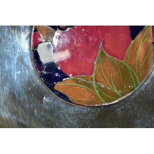 359 - A MOORCROFT POTTERY MOTIF INLAID INTO A SMALL METAL BOWL, the Moorcroft motif in Pomegranate pattern... 