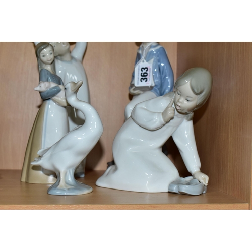 363 - FIVE LLADRO FIGURES, comprising Boy with Yacht model no 4810, sculptor Salvador Furio, issued 1972-1... 