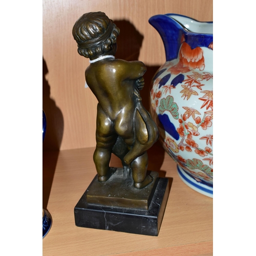 369 - A BRONZE FIGURE AND A GROUP OF CERAMICS, comprising a bronze figure of a boy with a gun and two bird... 