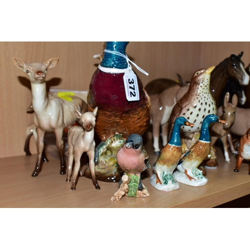 372 - A QUANTITY OF BESWICK ANIMAL FIGURES, comprising a large Pheasant impressed 1225 mark to base, a Son... 