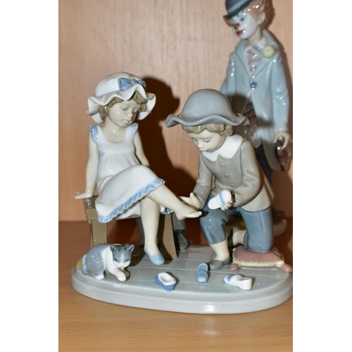 374 - A GROUP OF LLADRO FIGURES, comprising 'Try This One' 5361 - Regino Torrijos 1986-1998, 'Chit Chat' 5... 