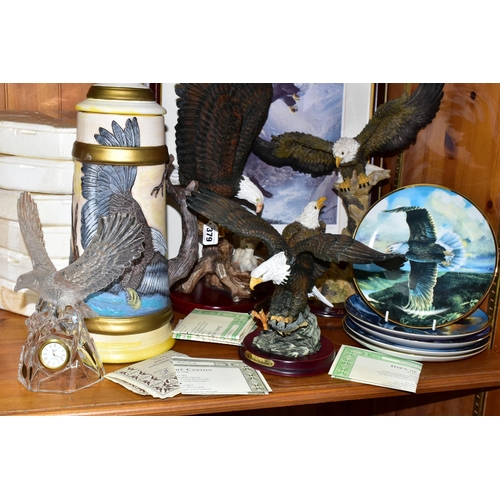 379 - A COLLECTION OF BALD EAGLE ORNAMENTS AND COLLECTOR'S PLATES, comprising an Italian RCR  mantel clock... 