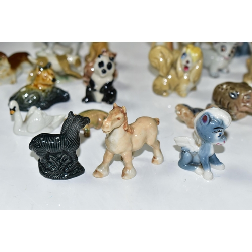 385 - A GROUP OF ASSORTED CERAMICS, comprising a Beswick Fox 1017 (chipped ear), three miniature Cloisonné... 