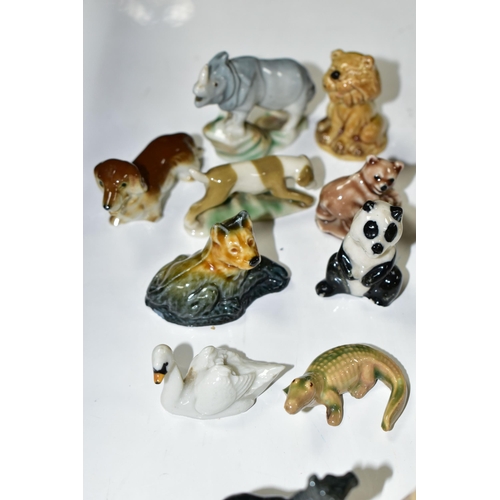 385 - A GROUP OF ASSORTED CERAMICS, comprising a Beswick Fox 1017 (chipped ear), three miniature Cloisonné... 