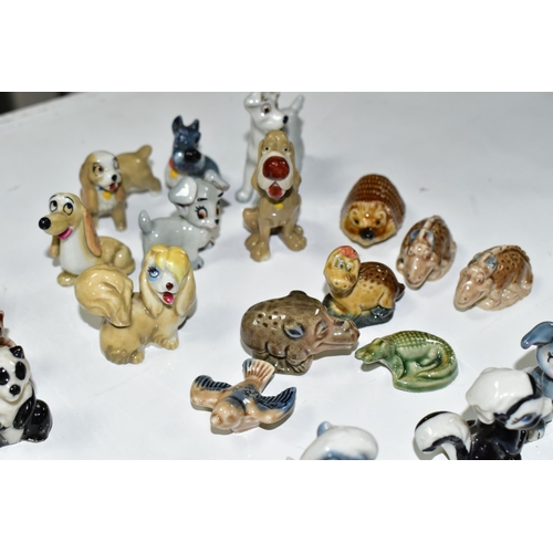 385 - A GROUP OF ASSORTED CERAMICS, comprising a Beswick Fox 1017 (chipped ear), three miniature Cloisonné... 