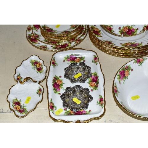 394 - A QUANTITY OF ROYAL ALBERT 'OLD COUNTRY ROSES' PATTERN TEAWARES, comprising a large centre piece dis... 