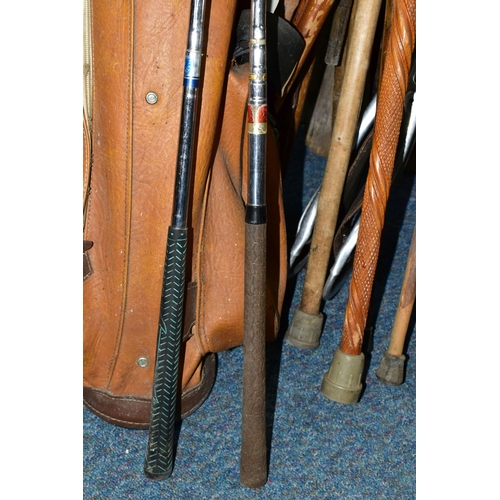 395 - A LARGE QUANTITY OF WALKING STICKS AND A SET VINTAGE GOLF CLUBS, to include a set of Dunlop 'Arnold ... 