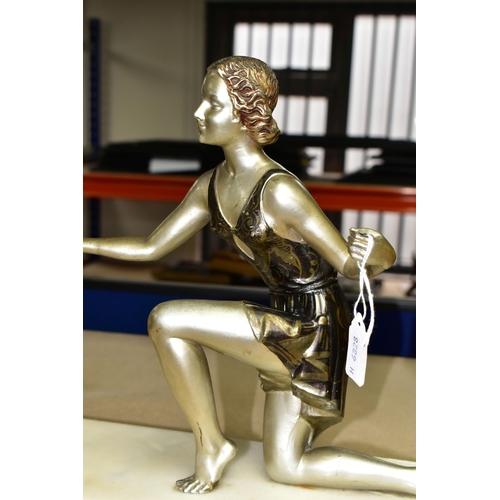 399 - AN ART DECO FIGURAL PHOTOGRAPH FRAME, the painted spelter kneeling female figure, wearing a short fl... 