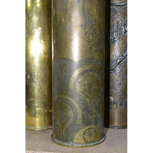 400 - THREE PIECES OF WW1 TRENCH ART AND A PLAIN SHELL CASE, comprising a vase with rim cut into petals, d... 