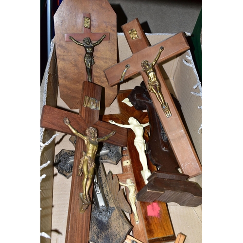 411 - A BOX OF EIGHT CRUCIFIXES, to include two freestanding examples, one mounted to an octagonal wooden ... 