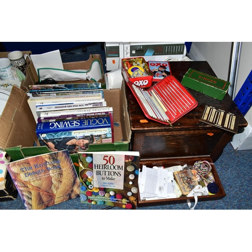 412 - TWO BOXES AND LOOSE SEWING MACHINE, ACCESSORIES, HABERDASHERY AND SEWING BOOKS, to include a Singer ... 