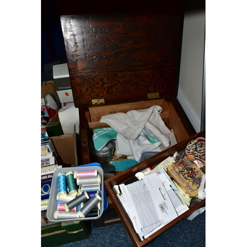 412 - TWO BOXES AND LOOSE SEWING MACHINE, ACCESSORIES, HABERDASHERY AND SEWING BOOKS, to include a Singer ... 